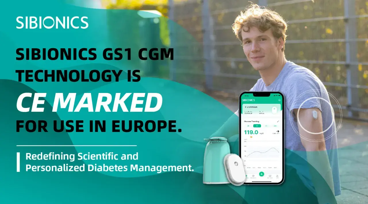 Młody mężczyzna z czujnikiem SIBIONICS GS1 na ramieniu, prezentujący technologię CGM. Aplikacja na telefonie pokazuje dane o glukozie.